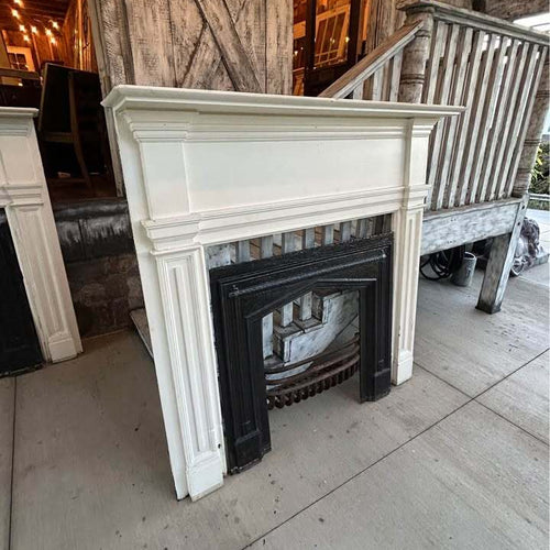 Pair of Antique Fireplace Mantels with Cast Iron Inserts and ￼Cast Iron Fire Baskets