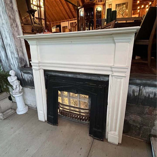Pair of Antique Fireplace Mantels with Cast Iron Inserts and ￼Cast Iron Fire Baskets