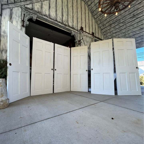 Three sets of 60”  Solid Wood Six Panel Bypass Doors