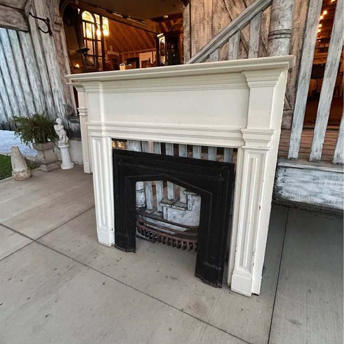 Pair of Antique Fireplace Mantels with Cast Iron Inserts and ￼Cast Iron Fire Baskets