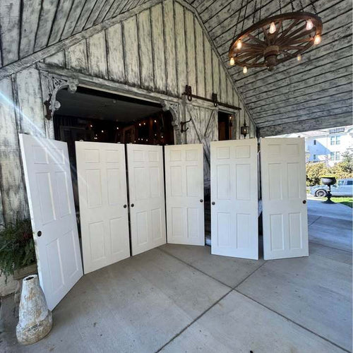 Three sets of 60”  Solid Wood Six Panel Bypass Doors