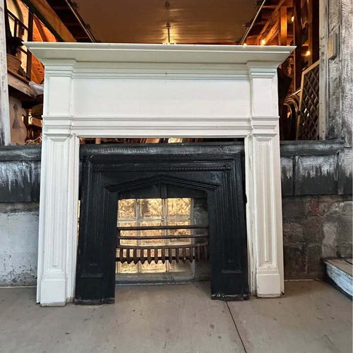 Pair of Antique Fireplace Mantels with Cast Iron Inserts and ￼Cast Iron Fire Baskets