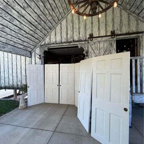 Three sets of 60”  Solid Wood Six Panel Bypass Doors