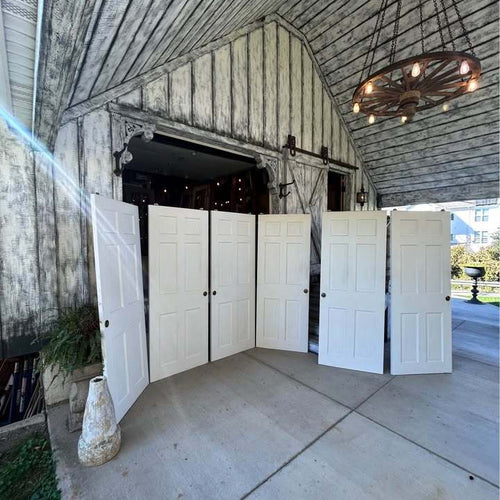 Three sets of 60”  Solid Wood Six Panel Bypass Doors