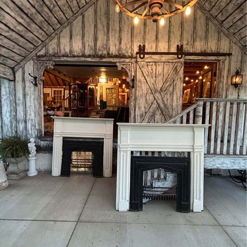 Pair of Antique Fireplace Mantels with Cast Iron Inserts and ￼Cast Iron Fire Baskets